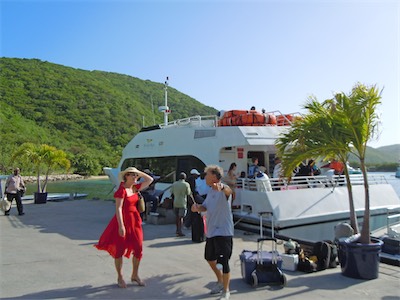 Before we board the Peter Island Yacht, a photographer insists on taking a photo of the two of us