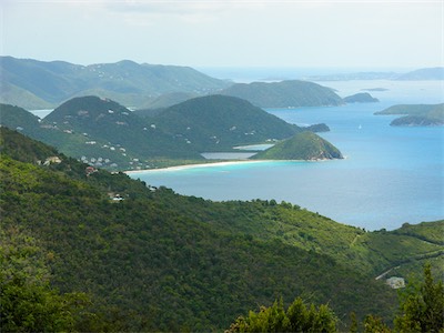 Long Bay, Belmont Pond, Smuggler’s Cove, Steele Point and, in the distance, St John in the US Virgin Islands, with St Thomas visible in the haze